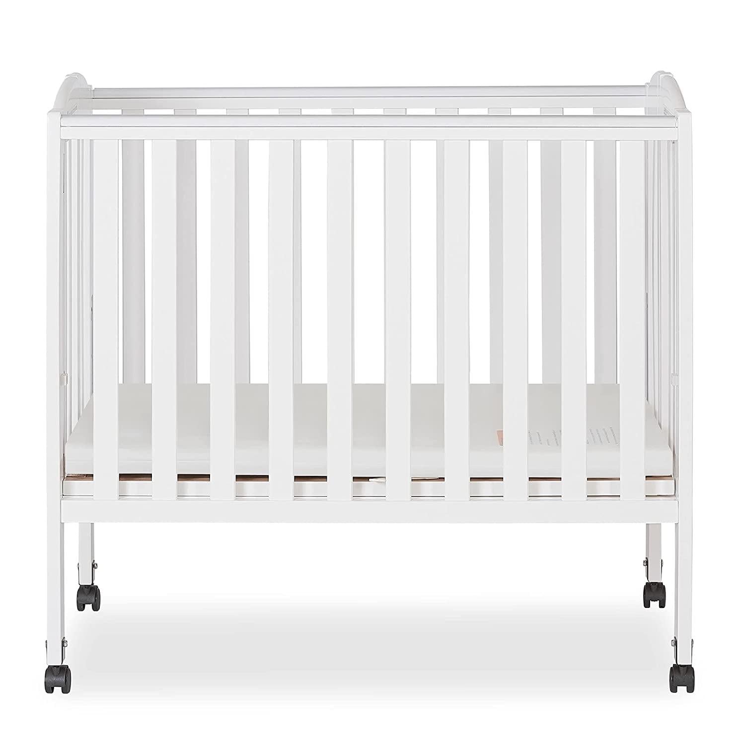 Dream On Me 2-in-1 Folding Portable Mini Crib in White. Mattress Pad Included. Easy to Fold and Store Baby Crib. Two Adjustable Mattress Height positions Convertible Crib