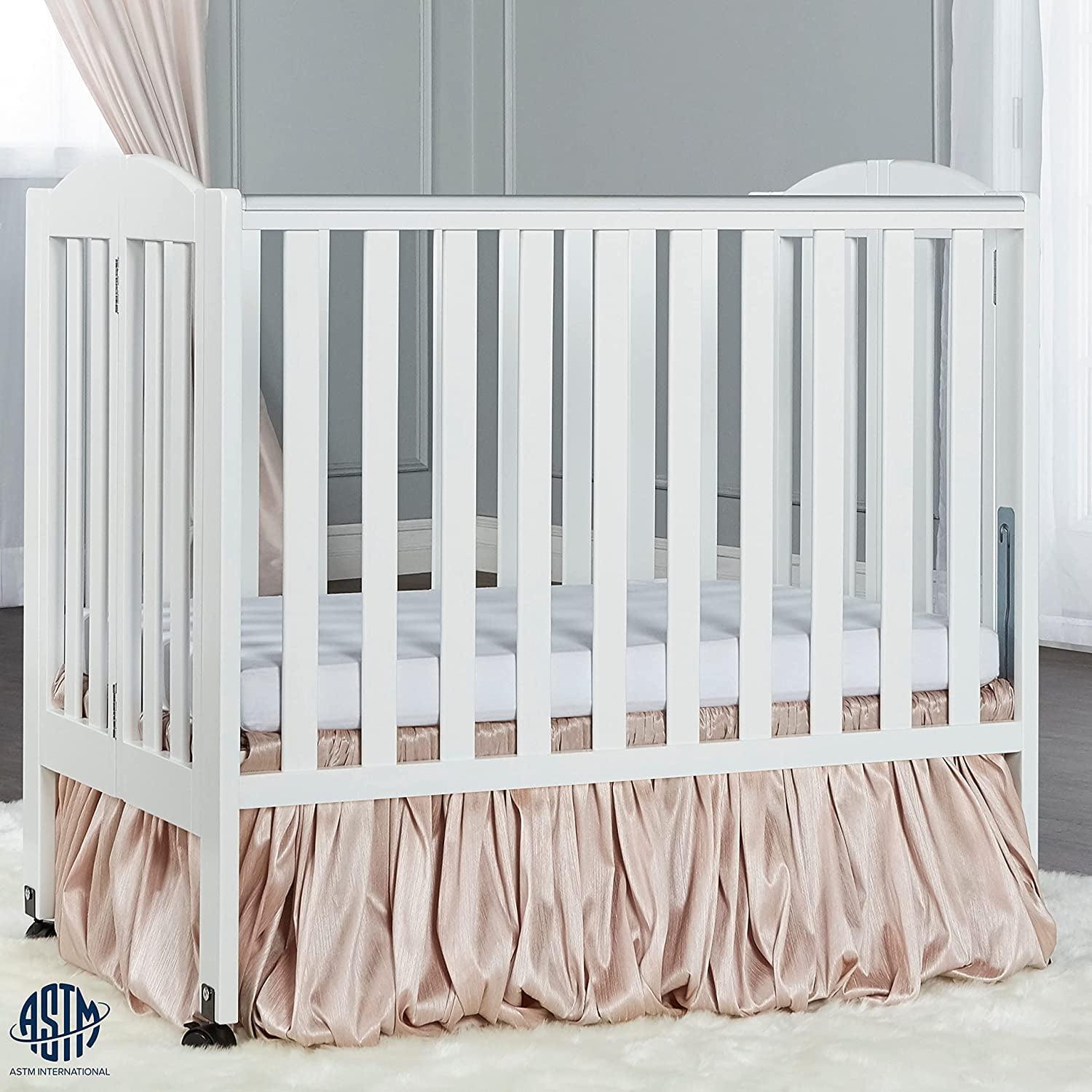 Dream On Me 2-in-1 Folding Portable Mini Crib in White. Mattress Pad Included. Easy to Fold and Store Baby Crib. Two Adjustable Mattress Height positions Convertible Crib