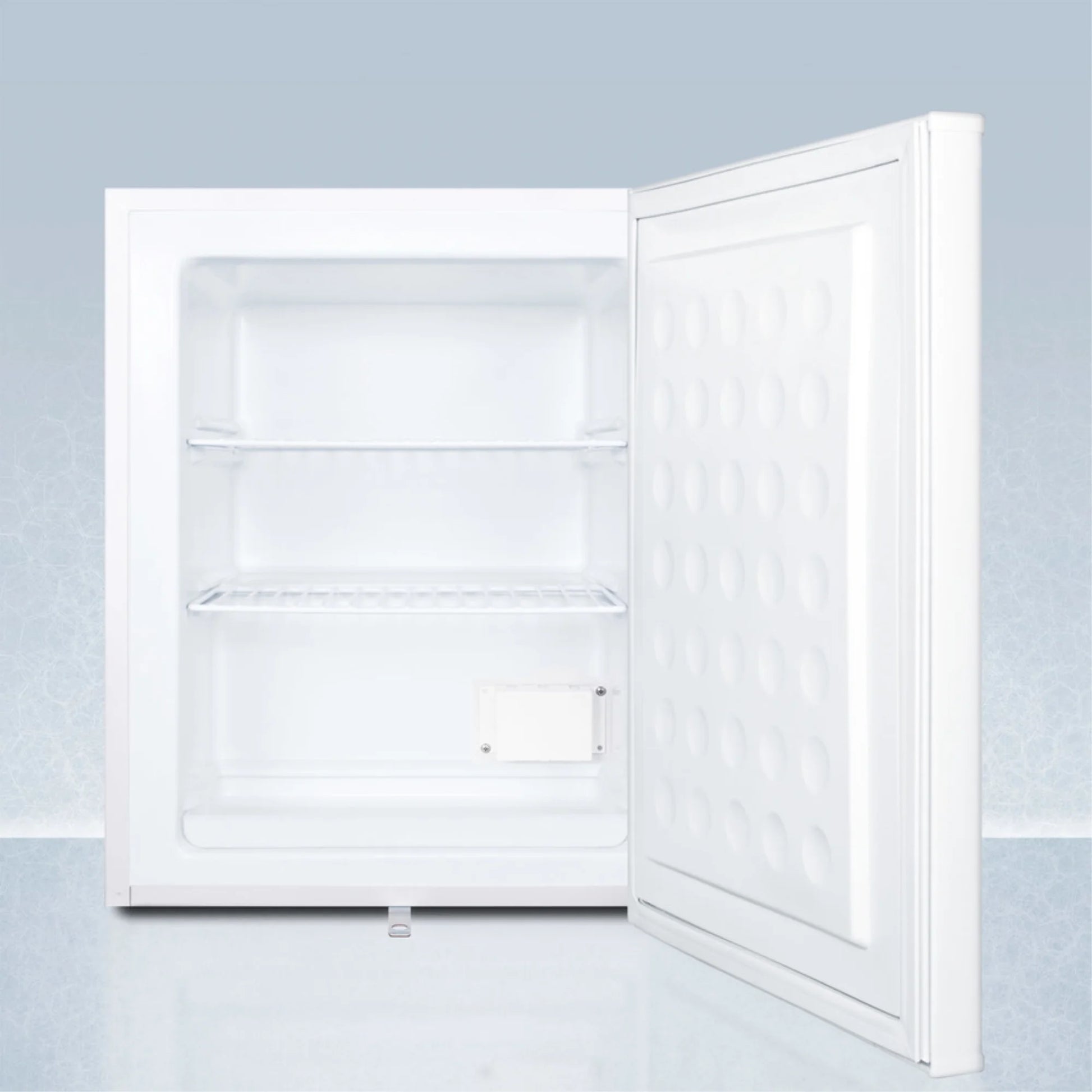 Compact manual defrost all-freezer with lock and probe hole